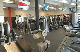 Fitness center equipment floor cleaned by Rangel Janitorial